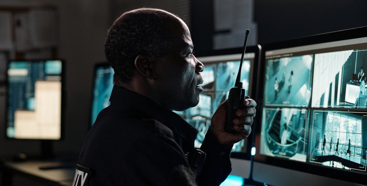 A Sentinel operator watching a wall of live camera feeds