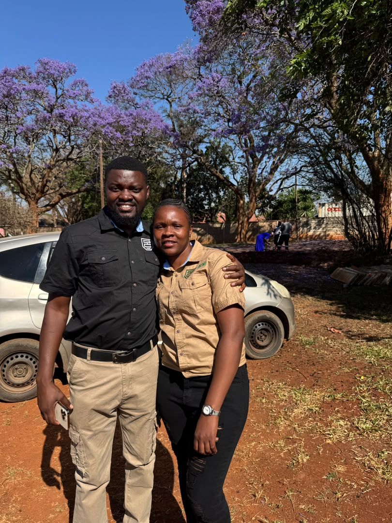 Two Sentinel colleagues outside the office